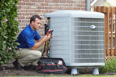 Outdoor AC Unit Inspection Rohnert Park HVAC technician inspecting an outdoor AC unit in Rohnert Park